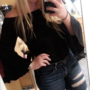 Bell-sleeve off the shoulder shirt